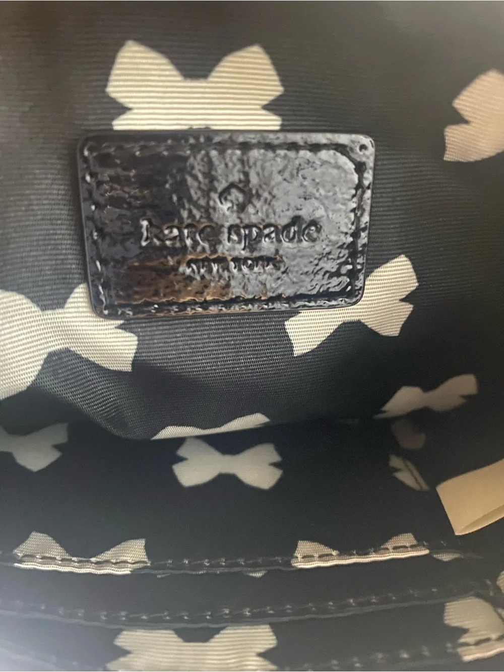 kate spade Caramel Wristlet with Black Bow and Gold Heart-Link Extender